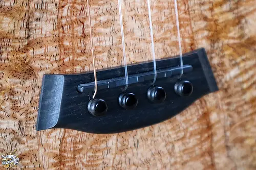 Picture showing a close up of the bridge of the Kanile'a Ukulele